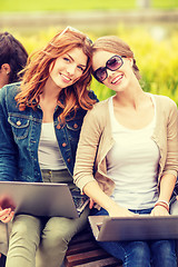 Image showing two female students with laptop computers