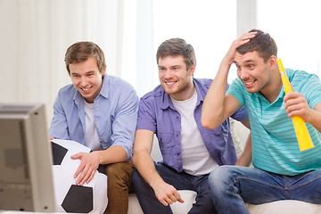 Image showing happy male friends with football and vuvuzela