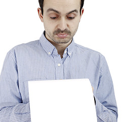 Image showing Man holding a paper