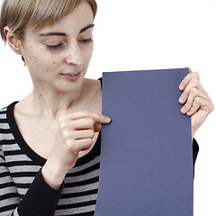 Image showing Woman holding a paper