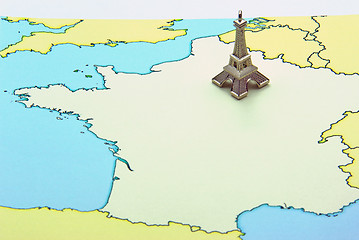 Image showing Eiffel Tower miniature on map