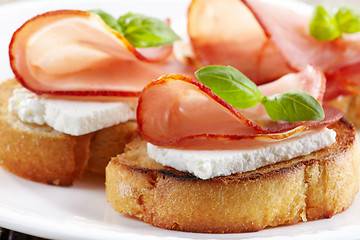 Image showing Toasted bread with serrano ham and fresh cheese