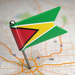 Image showing Guyana Small Flag on a Map Background.