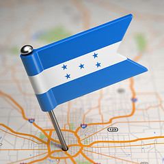 Image showing Honduras Small Flag on a Map Background.