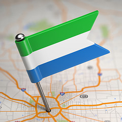 Image showing Sierra Leone Small Flag on a Map Background.