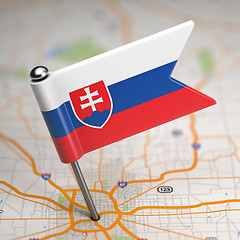 Image showing Slovakia Small Flag on a Map Background.