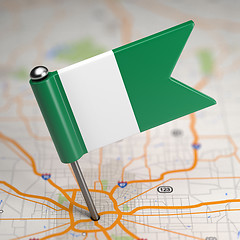 Image showing Nigeria Small Flag on a Map Background.