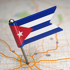 Image showing Cuba Small Flag on a Map Background.