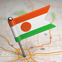 Image showing Niger Small Flag on a Map Background.