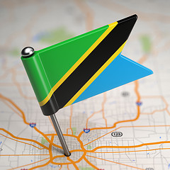 Image showing Tanzania Small Flag on a Map Background.