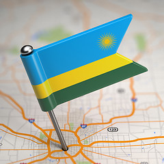 Image showing Rwanda Small Flag on a Map Background.