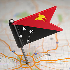 Image showing Papua New Guinea Small Flag on a Map Background.