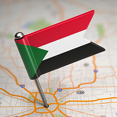 Image showing Sudan Small Flag on a Map Background.