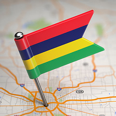 Image showing Mauritius Small Flag on a Map Background.