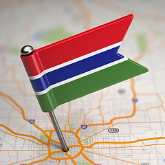 Image showing Gambia Small Flag on a Map Background.
