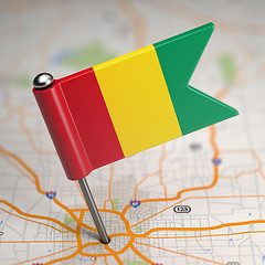 Image showing Guinea Small Flag on a Map Background.