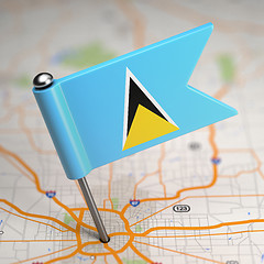 Image showing Saint Lucia Small Flag on a Map Background.