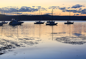 Image showing Boats moored at dusk