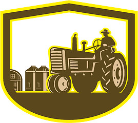 Image showing Farmer Driving Tractor Plowing Farm Shield Retro