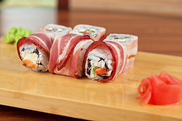 Image showing Sushi roll with bacon