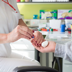 Image showing Blood type testing by prick test.