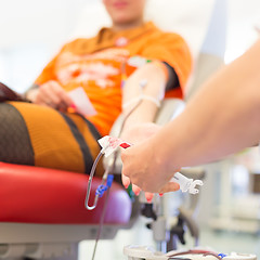 Image showing Nurse and blood donor at donation.