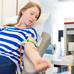 Image showing Blood donor at donation.