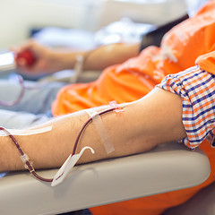 Image showing Blood donor at donation.