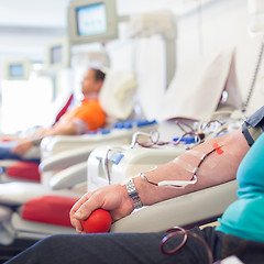 Image showing Blood donor at donation.