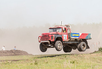 Image showing Jumping truck on racing line