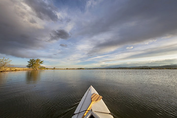 Image showing canoe with a paddle on lake