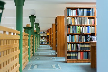 Image showing Library bookshelf closeup with letter