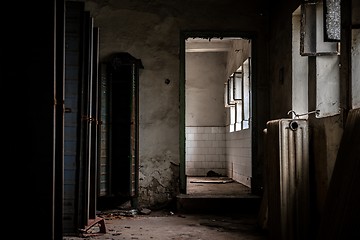 Image showing Dark room with steel lockers