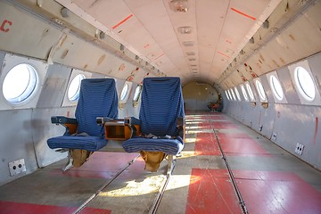 Image showing Interior of an airplane with many seats