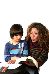 Image showing Mother and son reading