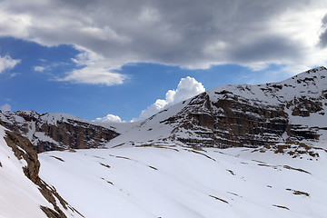 Image showing Snow rocks and cloudy sky