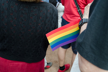 Image showing small paper rainbow flag gay parade symbol  