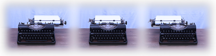 Image showing Old typewriter on wooden table