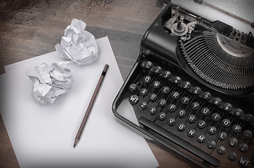 Image showing Close-up of an old typewriter with paper