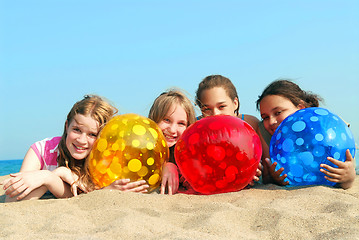 Image showing Four girls on a beach