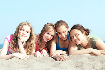 Image showing Four girls on a beach