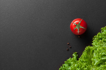 Image showing red tomatoes with green salad