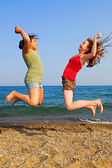 Image showing Girls jumping