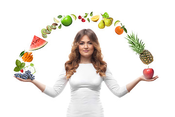 Image showing smiling woman with fruits isolated