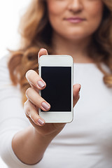 Image showing Woman hold cellphone on white