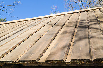 Image showing Roof farmhouse dwelling hewn planks close up