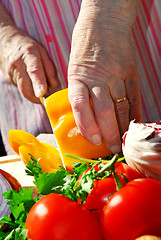 Image showing Cutting vegetables