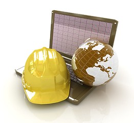 Image showing Hard hat and earth on a laptop 