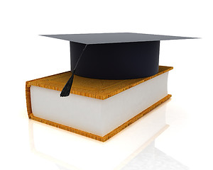 Image showing Graduation hat on a leather book