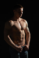 Image showing Muscle man posing in studio